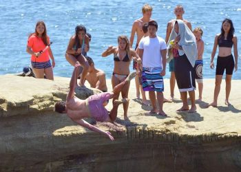 Cliff jumpers head over heels in Ocean Beach