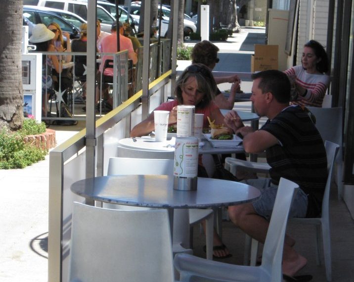 Village's sidewalk cafés are a seat of contention