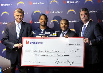 Driver, bystander hurt as car hits Pearl Street's Dick's Liquor