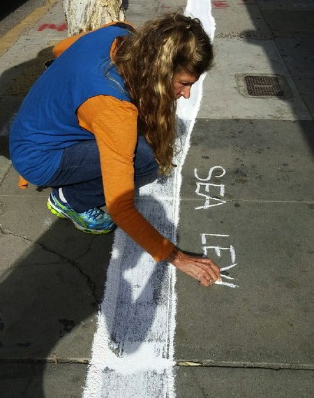 Activists raise awareness of climate change with ‘high tide line’ event in Mission Beach