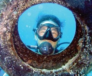 Surfrider paddles into Ocean Beach