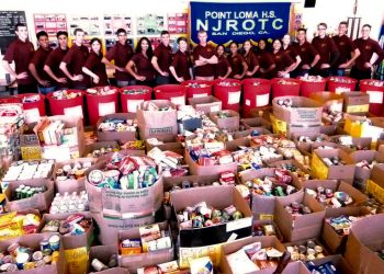 Temporary bridge shelter for homeless veterans opens in Midway District