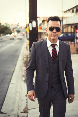 Ocean Beach’s Ariel Levine is one busy and well-dressed musician