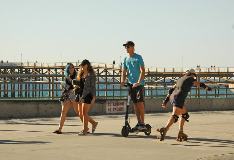 Beachgoers flock to the new trend: Bird scooters