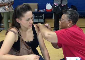 Temporary bridge shelter for homeless veterans opens in Midway District
