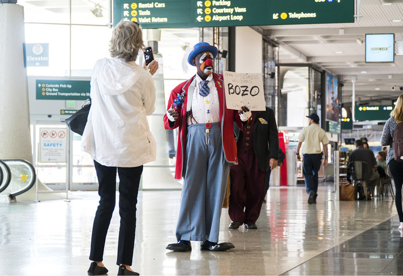 Clowning around while in line at San Diego Airport