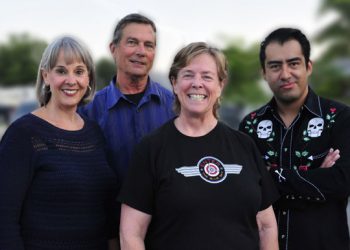 Mobile barber shop goes with the flow for beach cuts