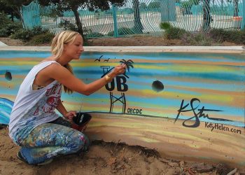 Artist makes a splash on guardrail outside skate park