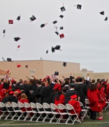 A message of service brushes campus (for real) at La Jolla High commencement