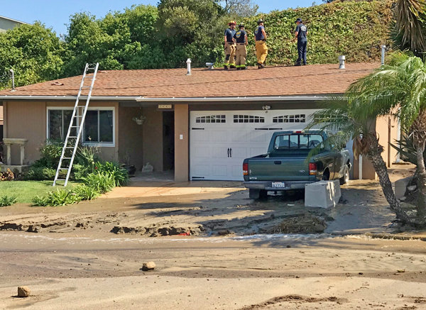 Water main break swamps Loma Portal neighborhood
