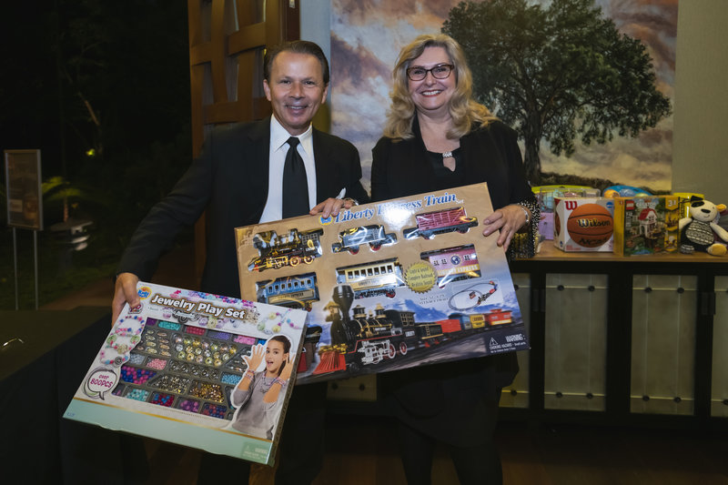 Realtors collect over $7,000 in toys for military families