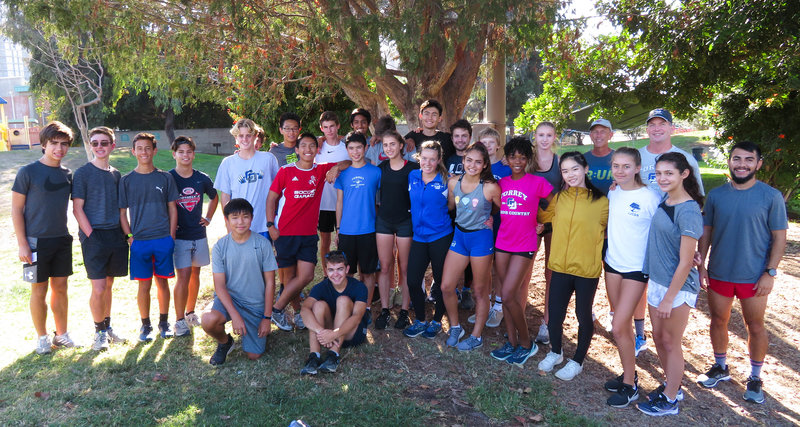 La Jolla Country Day School’s cross-country team collects items from community runs