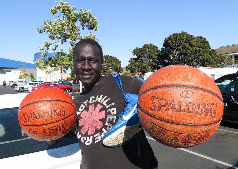 UCHS assistant basketball coach reflects on surviving potential refugee massacre