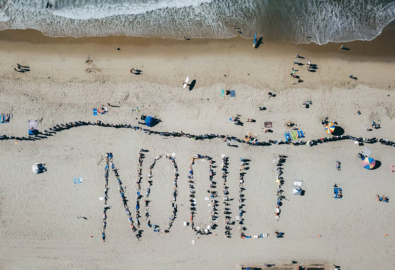 Hands Across the Sand event in Mission Beach