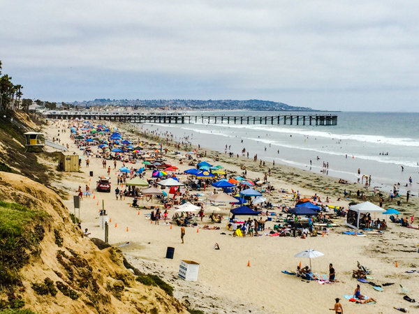 Cloudy weather lessens holiday beachgoers