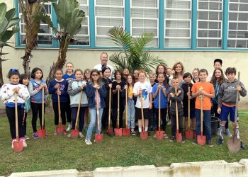 Students buy and plant palm tree at Ocean Beach Elementary for Earth Day