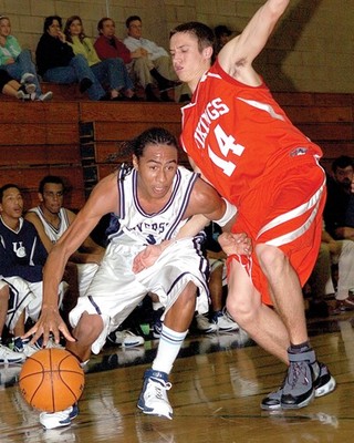 Lucas, Bishop's cagers split pair