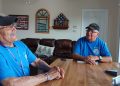 crown point residents and vietnam war veterans mike miller and wayne thompson reminiscing about their recent honor flight to washington, d.c.